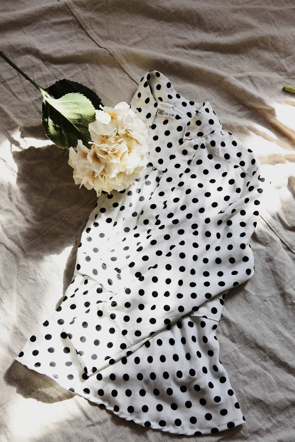 flat black and white polka dots blouse