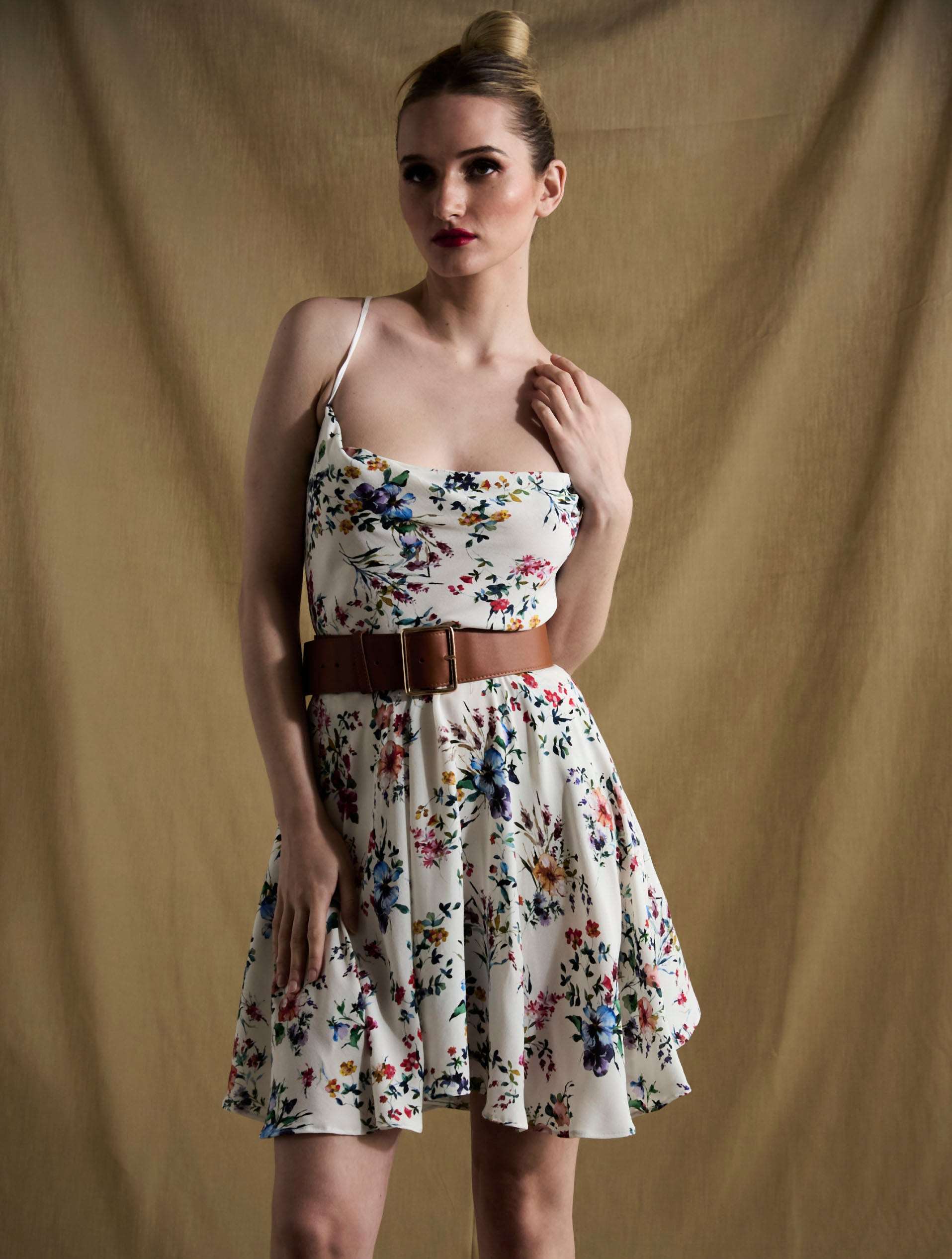 Sofia white floral dress on a model size S 